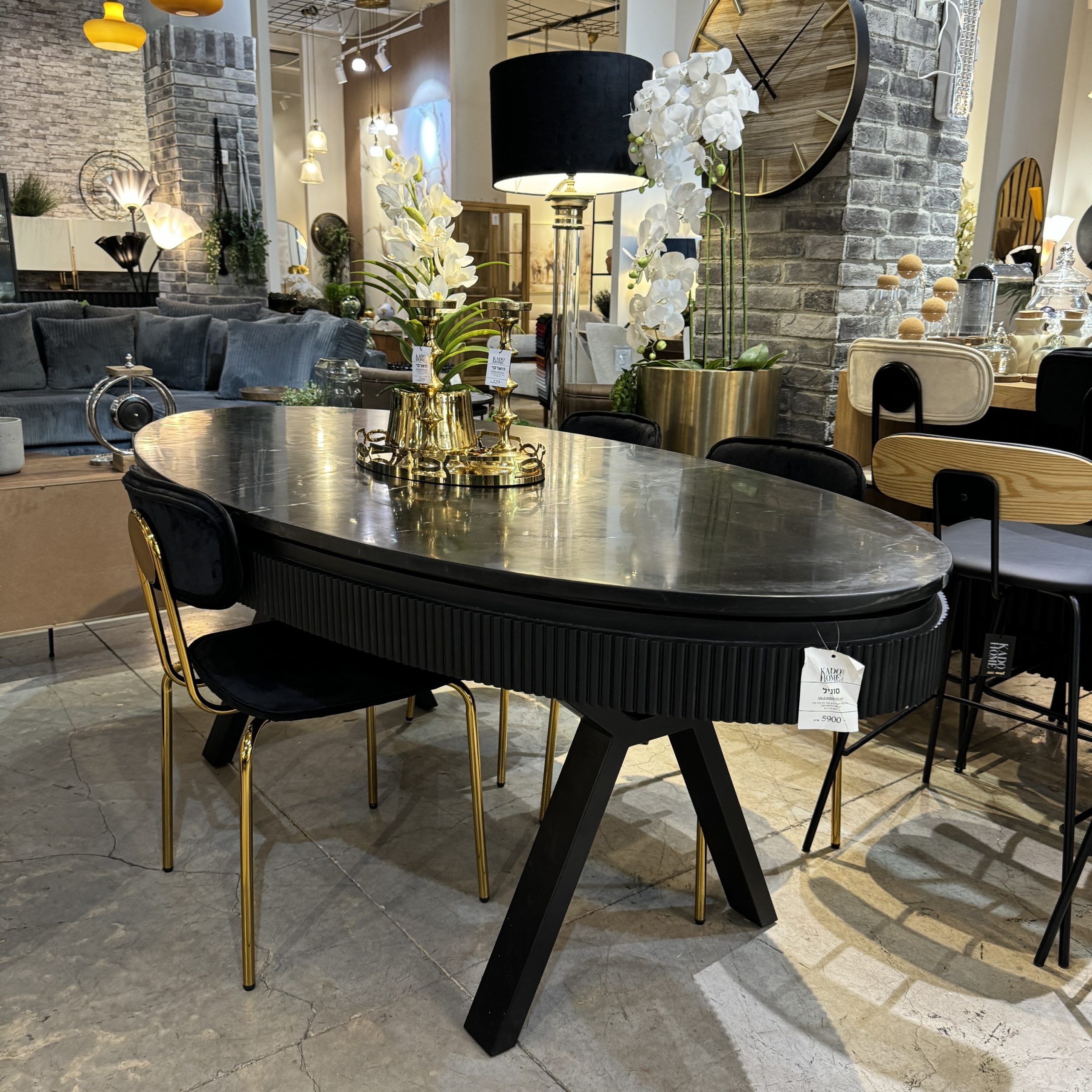 שולחן אוכל אובאלי שיש שחור רגל ברזל שחור דגם סוניל