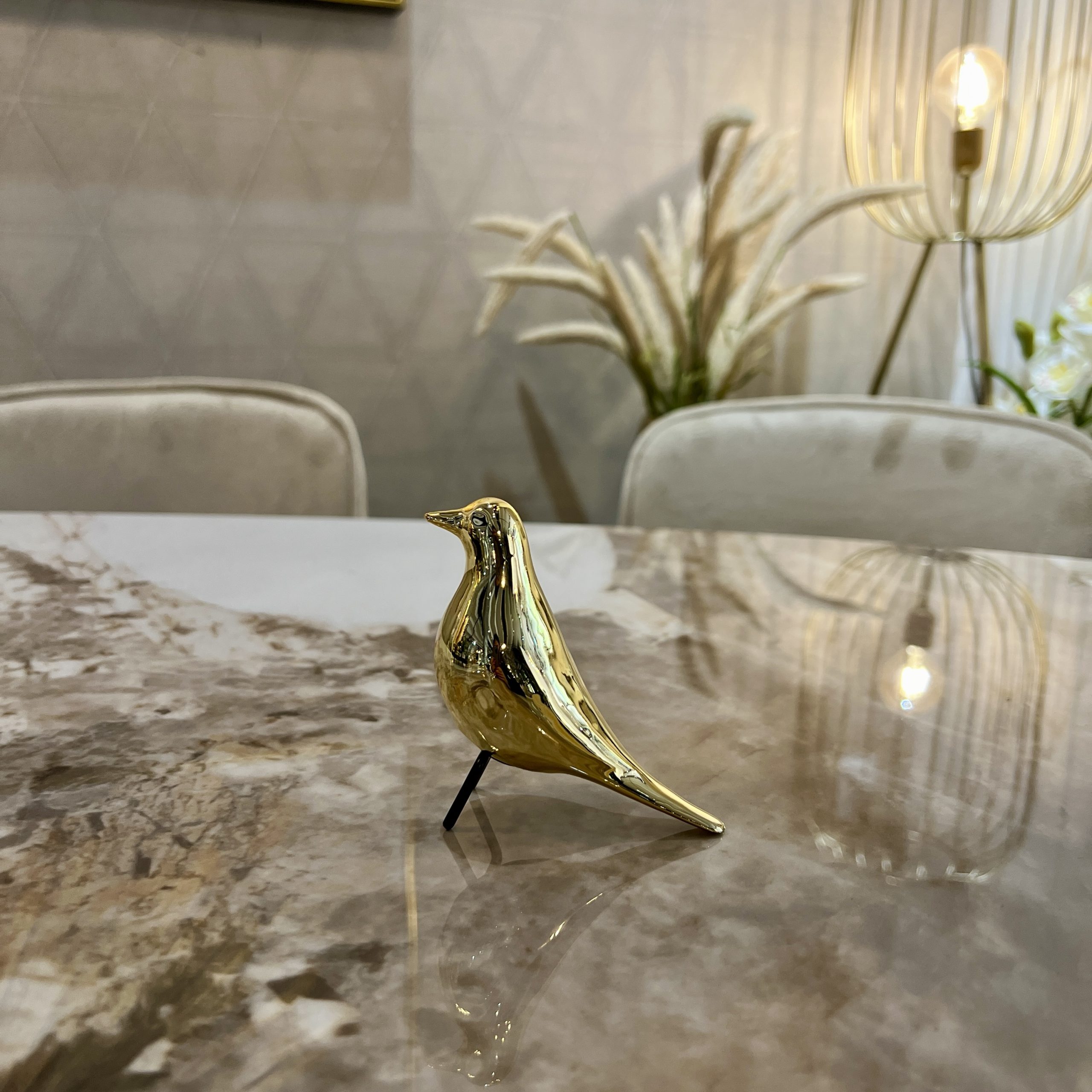 פסל ציפור יושבת מיני זהב / ניקל פסל ציפור יושבת מיני זהב / ניקל